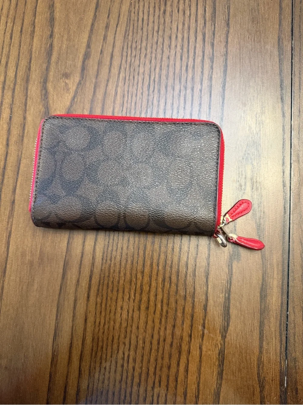 Coach signature zip
